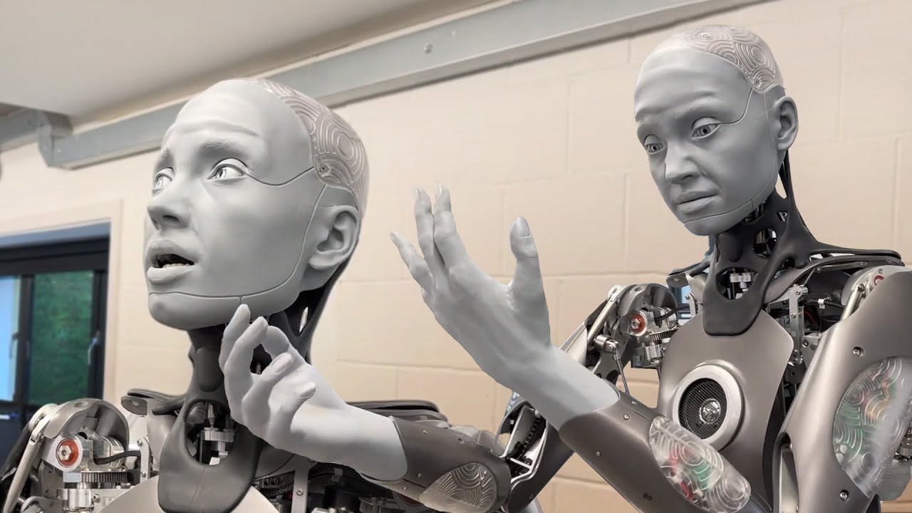 two humanoid Amika robots