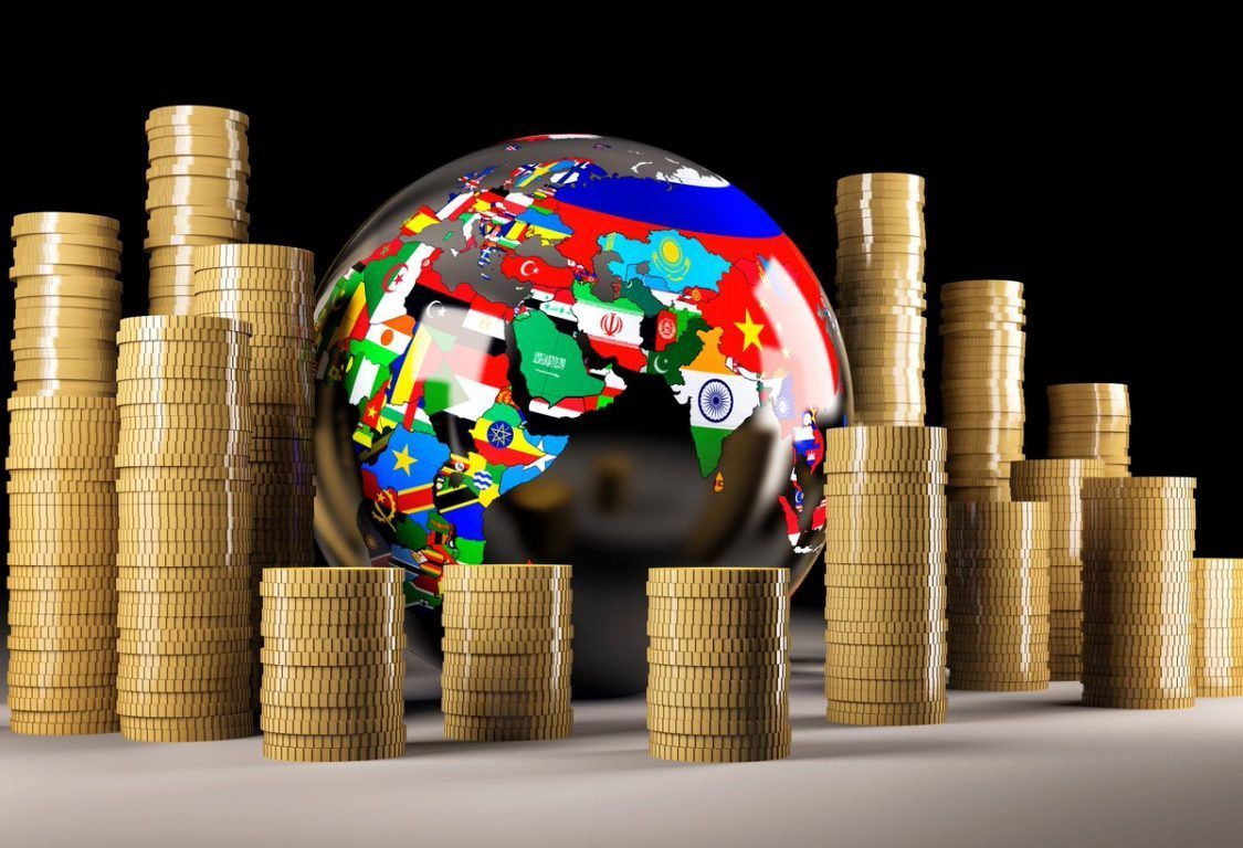 globe with country flags surrounded by coins