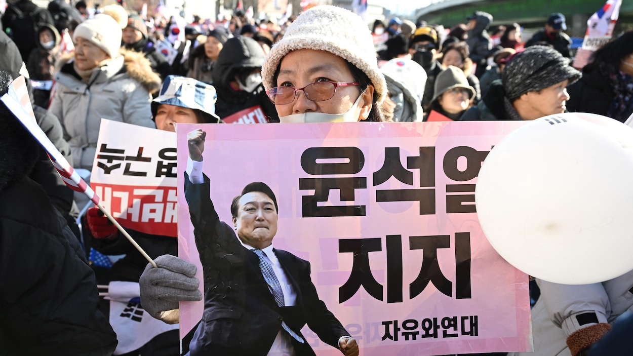 protests in south korea over president jung