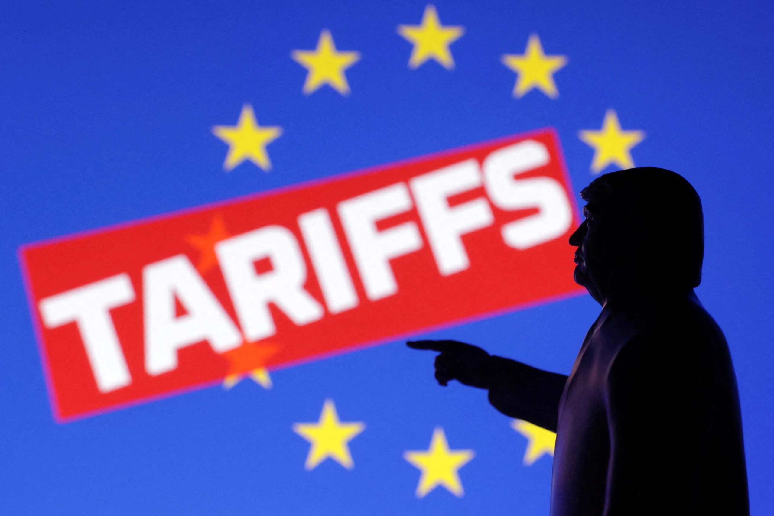 FILE PHOTO: Illustration shows 3D-printed miniature model depicting U.S. President Donald Trump depicting European Union flag and word "Tariffs"